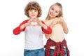 Kids gesturing hearts by hands