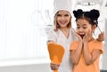 Kids girls play dentist and happy patient in dental office. Patient is happy with her healthy teeth Royalty Free Stock Photo