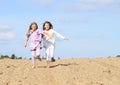 Kids - girls running on field Royalty Free Stock Photo