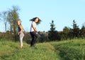 Kids - girls standing on meadow Royalty Free Stock Photo