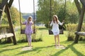 Kids - girls on swing