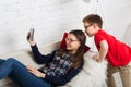 Kids in glasses with tablet, computer addiction