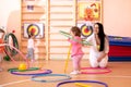 Kids group with colorful hula hoops Royalty Free Stock Photo