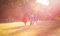 Kids in Halloween suits.