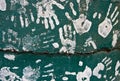 Kids Handprints on Green Painted Cement Royalty Free Stock Photo