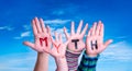 Kids Hands Holding Word Myth, Blue Sky