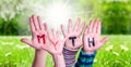 Kids Hands Holding Word Myth, Grass Meadow