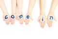 Kids hands painted with welcome come in sign