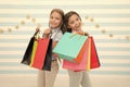 Kids happy carry bunch packages. Shopping with best friend concept. Girls like shopping. Kids happy small girls hold