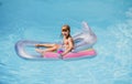 Kids happy summer. Summertime vacation. Child in pool. Boy swimming at swimmingpool. Funny kid on inflatable rubber Royalty Free Stock Photo