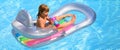 Kids happy summer. Summertime vacation. Child in pool. Boy swimming at swimmingpool. Funny kid on inflatable rubber Royalty Free Stock Photo