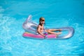 Kids happy summer. Summertime vacation. Child in pool. Boy swimming at swimmingpool. Funny kid on inflatable rubber Royalty Free Stock Photo