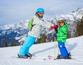 Kids has a fun on ski Royalty Free Stock Photo