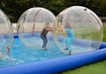 Kids having fun in air bubbles