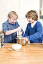 Kids having fun during a baking workshop Royalty Free Stock Photo