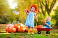 Kids having fun at pumpkin patch Royalty Free Stock Photo