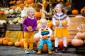 Kids having fun at pumpkin patch Royalty Free Stock Photo