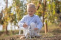 Kids having fun with toy airplane in field against nature background. Adventure and vacations children concept. Summer Royalty Free Stock Photo