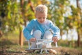 Kids having fun with toy airplane in field against nature background. Adventure and vacations children concept. Summer Royalty Free Stock Photo