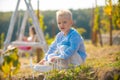 Kids having fun with toy airplane in field against nature background. Adventure and vacations children concept. Summer Royalty Free Stock Photo