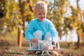 Kids having fun with toy airplane in field against nature background. Adventure and vacations children concept. Summer Royalty Free Stock Photo