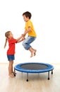 Kids having fun on a trampoline Royalty Free Stock Photo