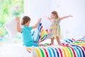 Kids having pillow fight Royalty Free Stock Photo