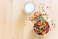 Kids healthy quick breakfast. Colorful rice cereal with milk on