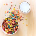 Kids healthy quick breakfast. Colorful rice cereal with milk on