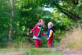 Kids hiking in autumn park Royalty Free Stock Photo