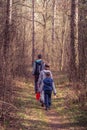 Kids hiking through a forest Royalty Free Stock Photo