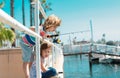 Kids hobby. Couple of kids fishing on pier. Child at jetty with rod. Boy and girl with fish-rod. Royalty Free Stock Photo