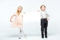 Kids holding blank card Royalty Free Stock Photo