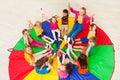 Kids holding hands together with teacher in gym Royalty Free Stock Photo