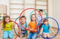 Kids holding hula hoops Royalty Free Stock Photo