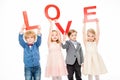 Kids holding word love Royalty Free Stock Photo