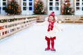 Kids ice skating in winter. Ice skates for child. Royalty Free Stock Photo