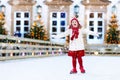 Kids ice skating in winter. Ice skates for child. Royalty Free Stock Photo