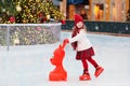 Kids ice skating in winter. Ice skates for child Royalty Free Stock Photo