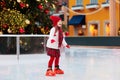 Kids ice skating in winter. Ice skates for child Royalty Free Stock Photo