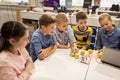 Kids with invention kit at robotics school Royalty Free Stock Photo