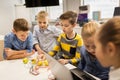 Kids with invention kit at robotics school Royalty Free Stock Photo