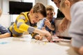 Kids with invention kit at robotics school Royalty Free Stock Photo
