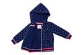 Kids jacket isolated. A stylish fashionable dark blue jacket with white dots and blue lining for the little girl. A sport jacket