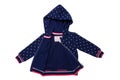 Kids jacket isolated. A stylish fashionable dark blue jacket with white dots and blue lining for the little girl. A sport jacket