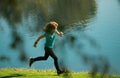 Kids jogging in park outdoor. Healthy sport activity for children. Little boy at athletics competition race. Young Royalty Free Stock Photo