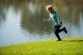 Kids jogging in park outdoor. Healthy sport activity for children. Little boy at athletics competition race. Young Royalty Free Stock Photo