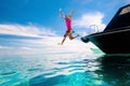 Child jumping into sea water. Yacht vacation Royalty Free Stock Photo