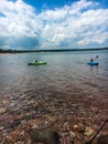 Kids Kayaking on a Lake Royalty Free Stock Photo