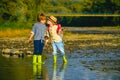 Kids kissing. Traveler hiking in the mountains river. Summer and water fun. Travel with kids. Love, trust and tenderness